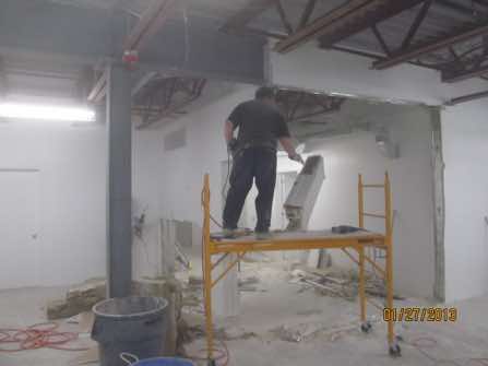The demolition of the drywall partitions proved difficult as they were 6" thick, insulated and double sheeated with drywall sheeting. The easiest method was to cut the walls apart in chunks with reciprocating saws.