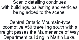 Scenic detailing continues  with buildings,